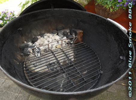 Juancho's Split Grill - As en kolen restanten van de vorige barbecue